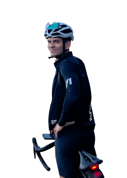 Oriol Subirana in cycling kit, standing beside his road bike